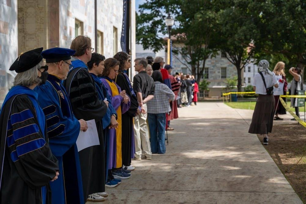 Faculty Assemble on Quad