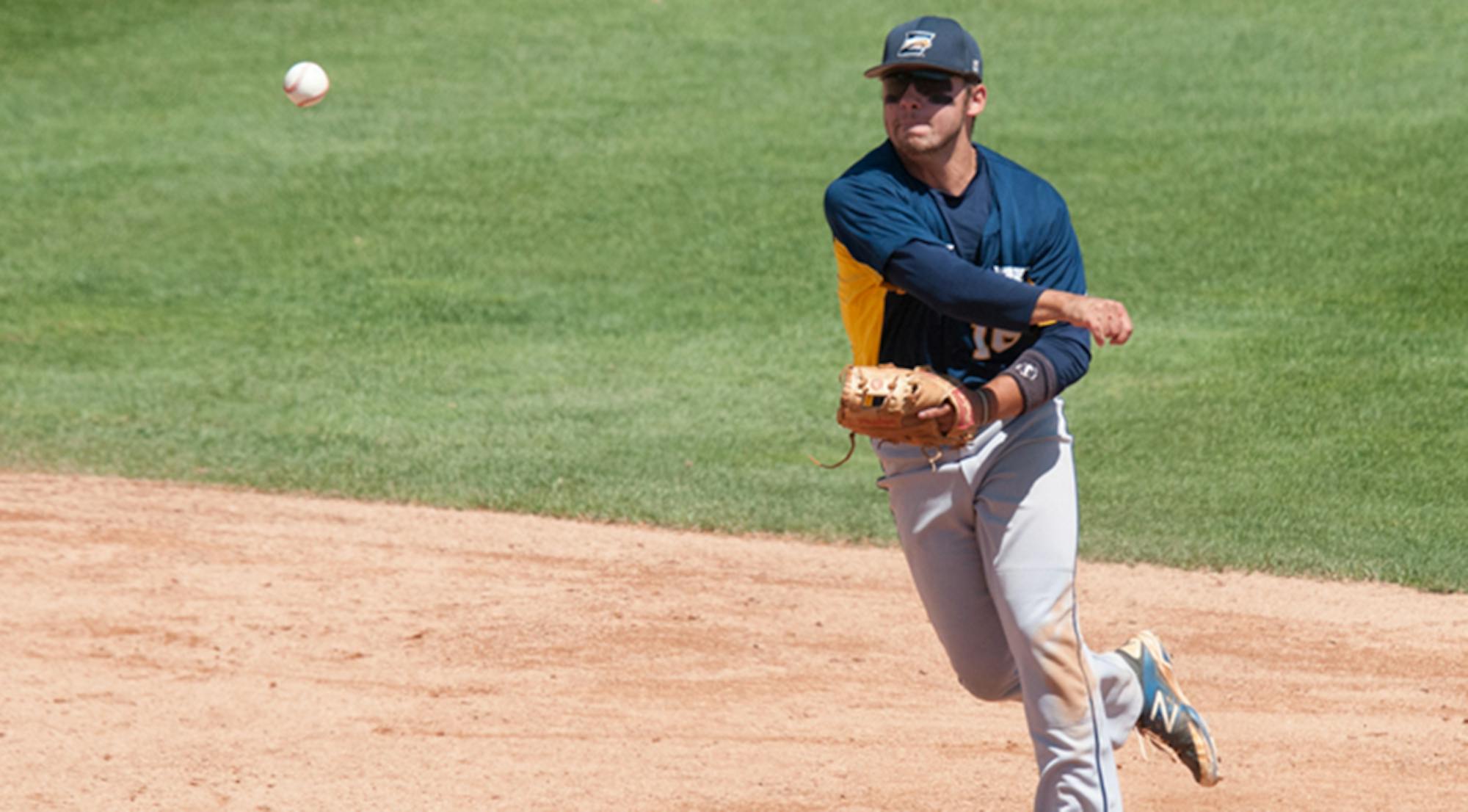 Junior infielder Jack Karras hurls the ball to his teammate. Karras and the Eagles split two games against Maryville College (Tenn.) last weekend. | Courtesy of Emory Athletics