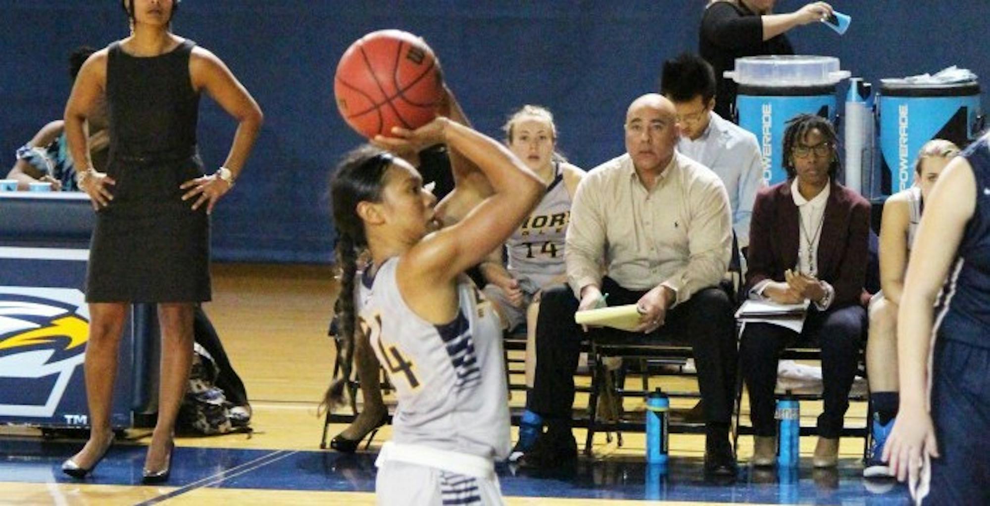 Junior guard Khadijah Sayyid attempts a free-throw. The Eagles continue to stand undefeated as their season progresses. Photo by Mark Spicer/Staff.