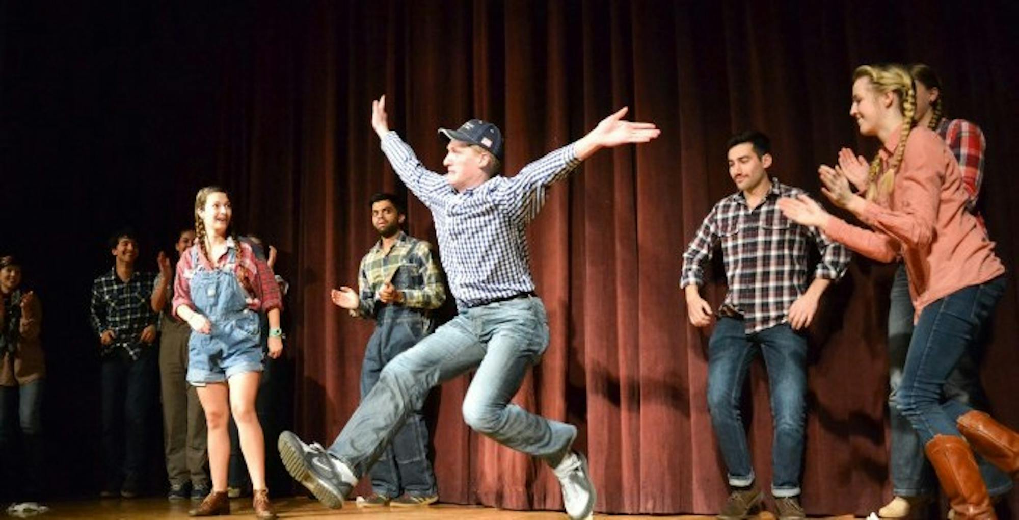 College freshman Jay Gillen (center) performs in
