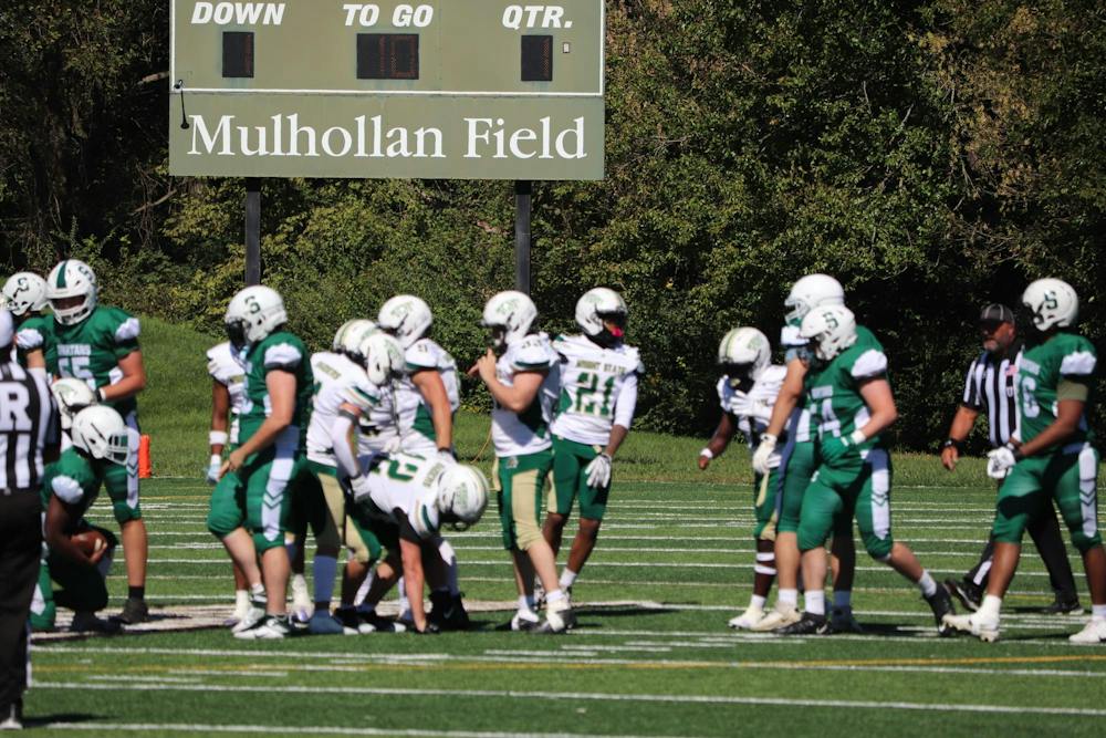 Wsu football players on Mulholllan Field 