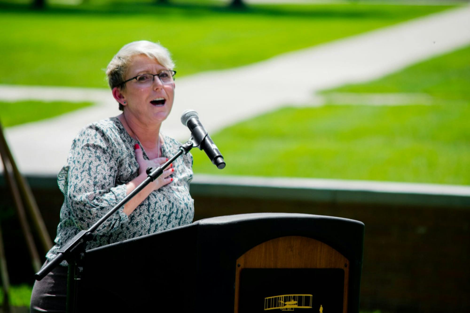 Photo of Sue Edwards, outdoors without a face mask