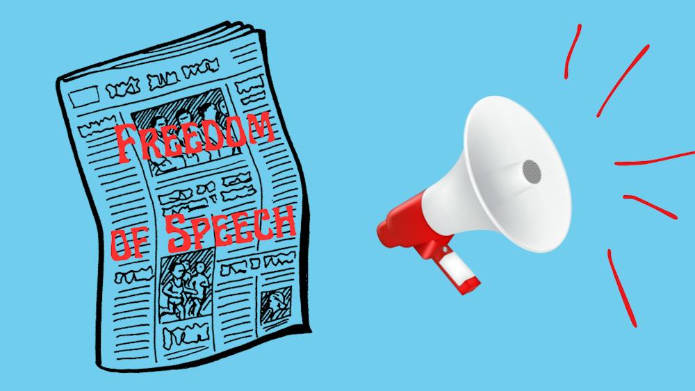 Newspaper with "Freedom of Speech" written on it next to a red megaphone