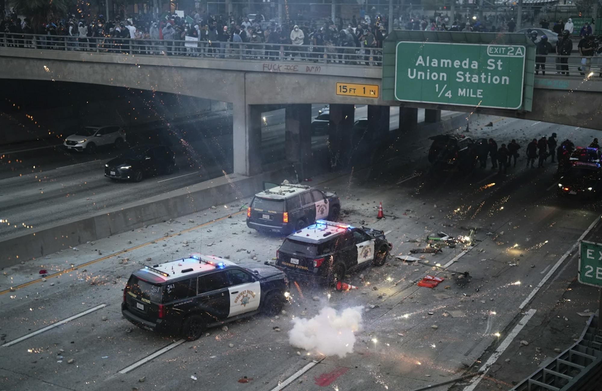 LA Riots. Flash bomb goes off on blocked freeway.png