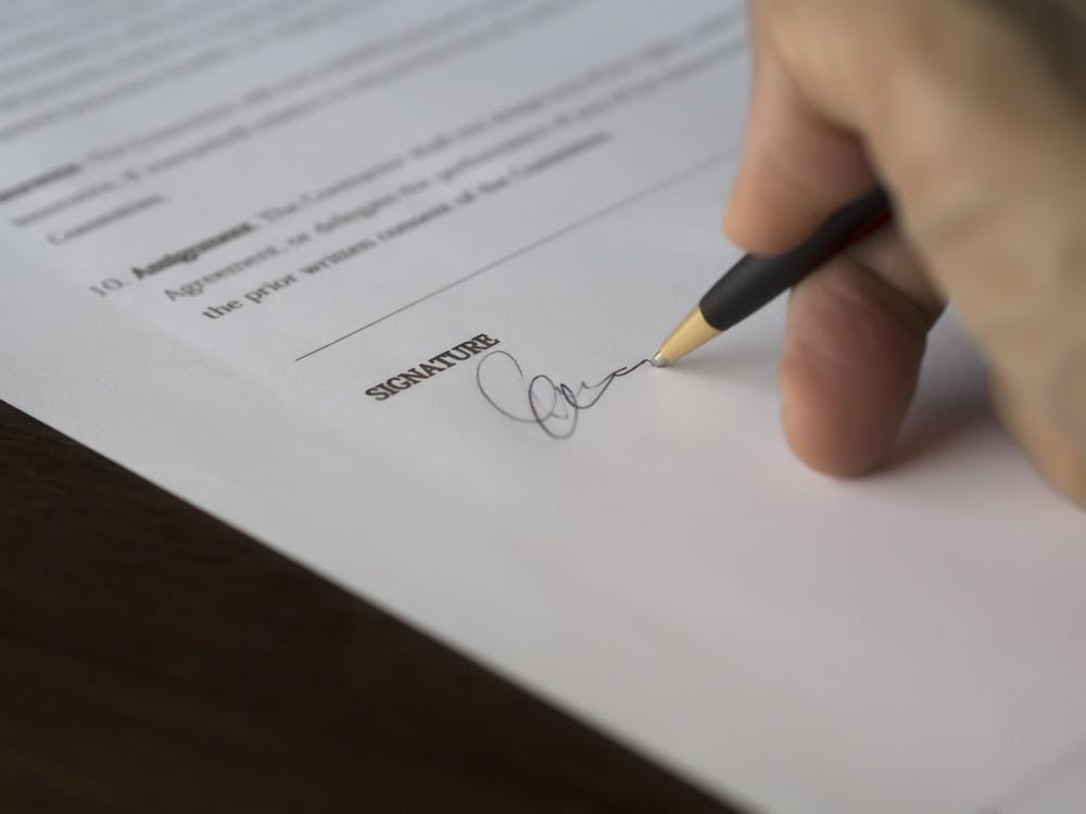 agreement-blur-business-close-up-261621-scaled